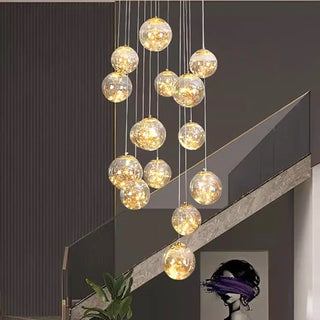 Gold crystal ball waterfall pendant illuminated — luxury chandelier