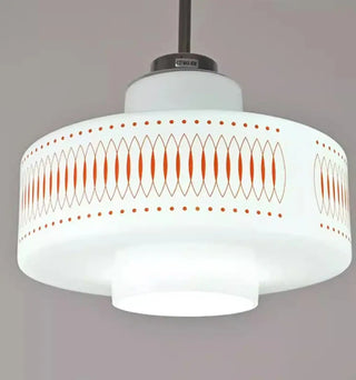Cylindrical pendant lamp detail, cream shade for soft diffused bedroom lighting