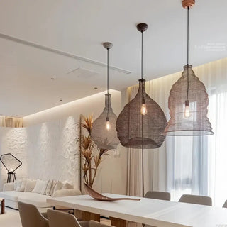 Braided metal pendant illuminated — artisan woven ceiling lamp