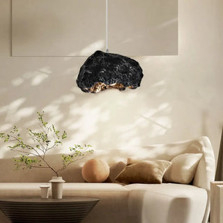 Designer pendant lamp with raw rock, warm glow cozy living room ceiling light