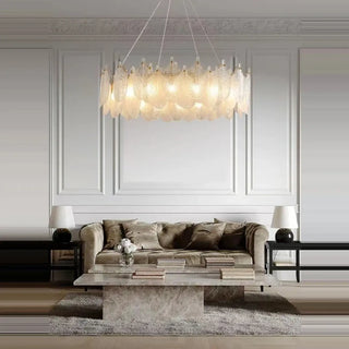 Elegant crystal pendant lamp in interior — gold leaf luxury fixture