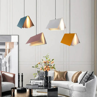 Designer book pendant in living room — colorful statement ceiling lamp