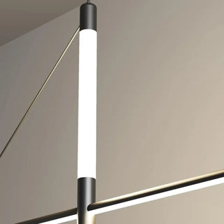Modern linear LED pendant over dining table — sleek black ceiling lamp
