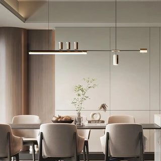 Black gold pendant light close-up, modern three-light elegant hanging ceiling lamp