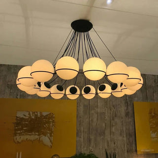 Designer black metal pendant, glass globe ceiling fixture for modern home