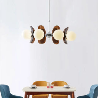 Retro sculpted glass pendant lamp, warm ambient ceiling fixture with elegant form