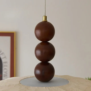 Modern pendant fixture, beige textile shade, wooden ball design for living room