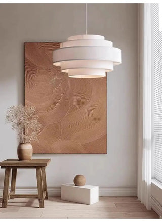 White tiered fabric pendant lamp, designer hanging ceiling light with warm glow