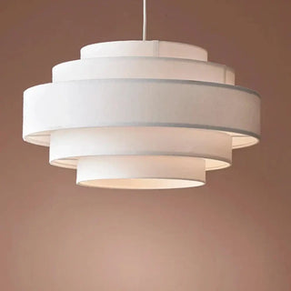 White tiered fabric ceiling pendant fixture, designer hanging lamp with warm lighting