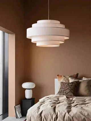 White tiered pendant light with fabric shade, designer warm hanging ceiling lamp