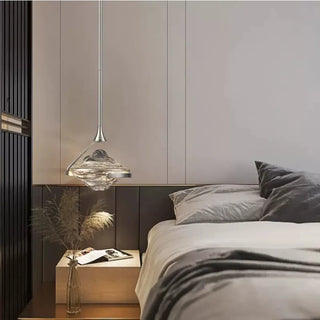Brass and textured glass pendant illuminated — contemporary ceiling fixture