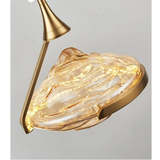 Textured glass pendant close-up — brass designer ceiling light fixture