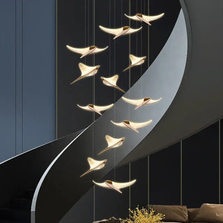 Designer gold LED hanging lamp with scroll motif, upscale pendant light for elegant home