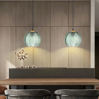 Green globe pendant light with leaf pattern, modern botanical ceiling lamp for dining room