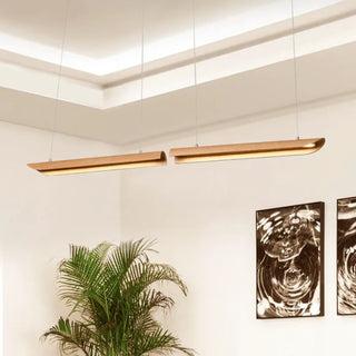 Curved wood pendant lamp illuminated — warm natural ceiling fixture