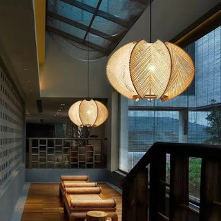 Fiber pendant lamp over dining table — soft diffused bohemian light