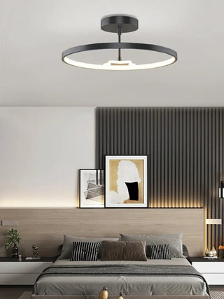 Modern ring pendant over dining table — minimalist metal ceiling fixture