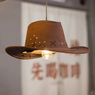 Rustic hat-shaped pendant illuminated — soft diffused western ceiling lamp