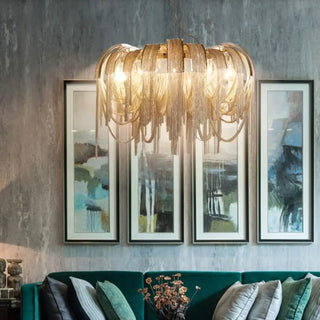 Designer gold pendant over dining table — string light hanging lamp