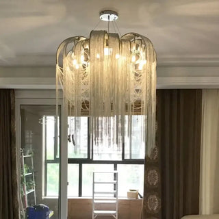 Gold string pendant lamp in interior — designer statement ceiling light