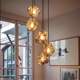 Clear glass ice cube pendant light close-up, designer suspension ceiling lamp