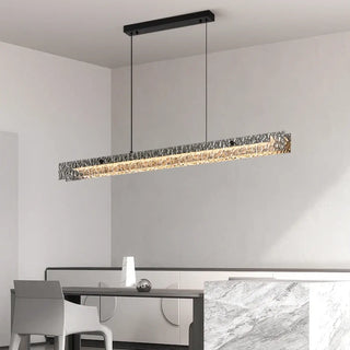 Silver metal pendant lamp with soft ambient lighting — designer ceiling fixture