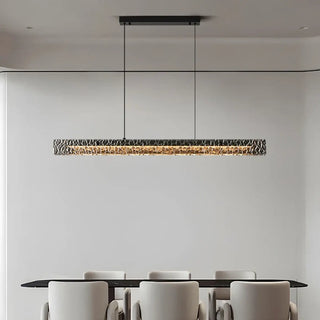 Silver metal pendant lamp over dining table — ambient ceiling light