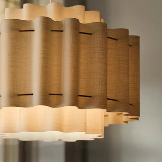 Organic pleated pendant close-up — textured designer ceiling lamp