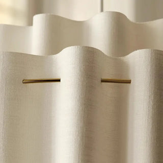 Sculptural pleated pendant lamp over table — designer ceiling fixture