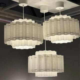 Pleated shade pendant in interior — contemporary sculptural hanging lamp
