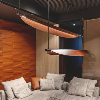 Modern geometric iron pendant light close-up, contemporary hanging ceiling fixture