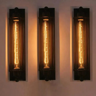 Industrial wall light installed view black bathroom