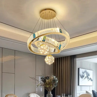 Modern crystal chandelier close-up — gold ring LED ceiling fixture
