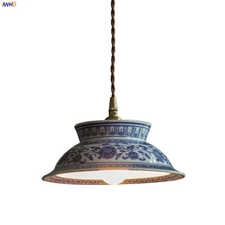 Ceramic artisan pendant light close-up, vintage-style handcrafted hanging ceiling lamp
