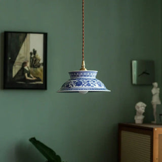 Vintage artisan ceramic pendant lamp with warm LED glow, handcrafted hanging ceiling light