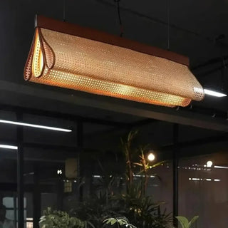Woven rattan pendant in dining room — natural warm hanging lamp