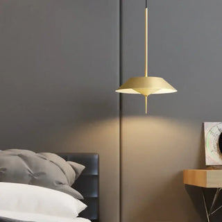 Elegant gold pendant light close-up — designer metal ceiling lamp