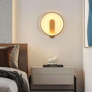 Round wood acrylic wall sconce close-up – beige minimalist indoor light