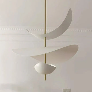 Modern white sculptural pendant light close-up, elegant designer ceiling lamp