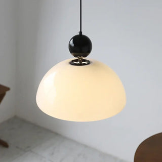 Opal glass pendant ceiling light close-up, modern soft diffused hanging fixture