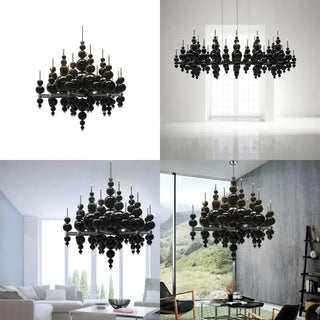 Black designer pendant light over dining table — luxury interior lamp