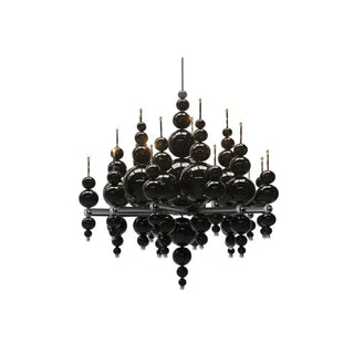 Luxury black pendant lamp illuminated — elegant designer ceiling light