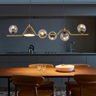 Globe cluster pendant in dining room — modern smoked glass chandelier