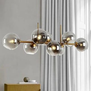 Modern gold pendant, glass globe design, glossy finish ceiling hanging lamp