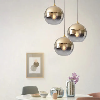 Round glass pendant light with gold tinted shade, modern hanging ceiling lamp