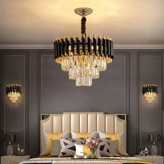 Cascading crystal chandelier illuminated — luxury gold ceiling fixture