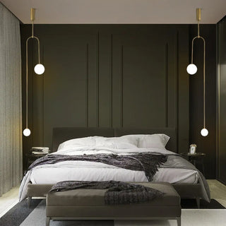 Black pendant ceiling fixture with ball sculptures, minimalist modern hanging lamp