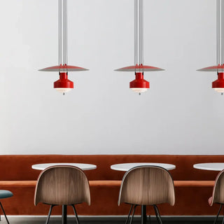 Modern red Scandinavian pendant light with circular diffuser, bold hanging ceiling lamp