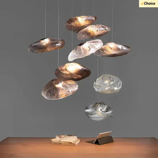 Modern pendant light with cloud-shaped glass, elegant sculptural hanging ceiling lamp