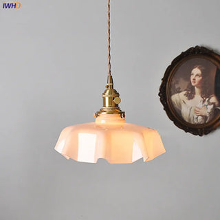 Retro brass pendant lamp with pink wavy glass, decorative hanging ceiling fixture